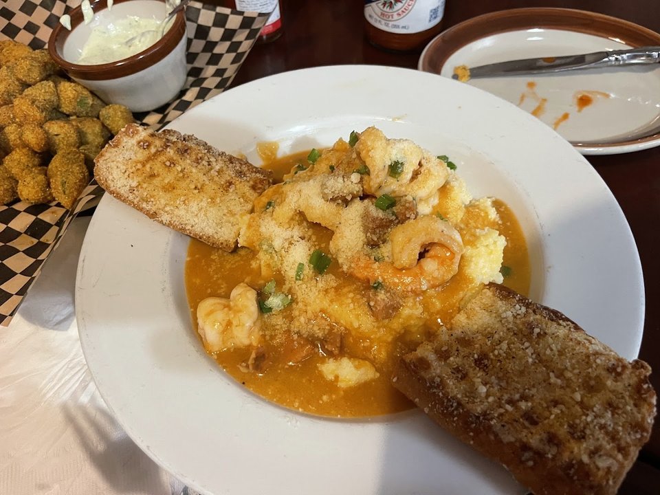 Hearty soul food served in a narrow café.