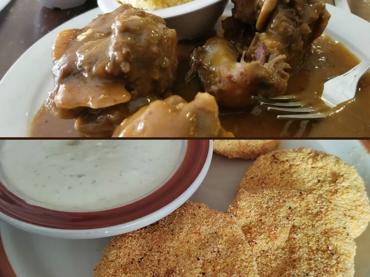 Comfort-food plates in a cozy restaurant setting.